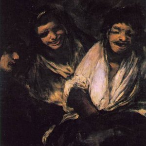 Two Young People Laughing at a Man
